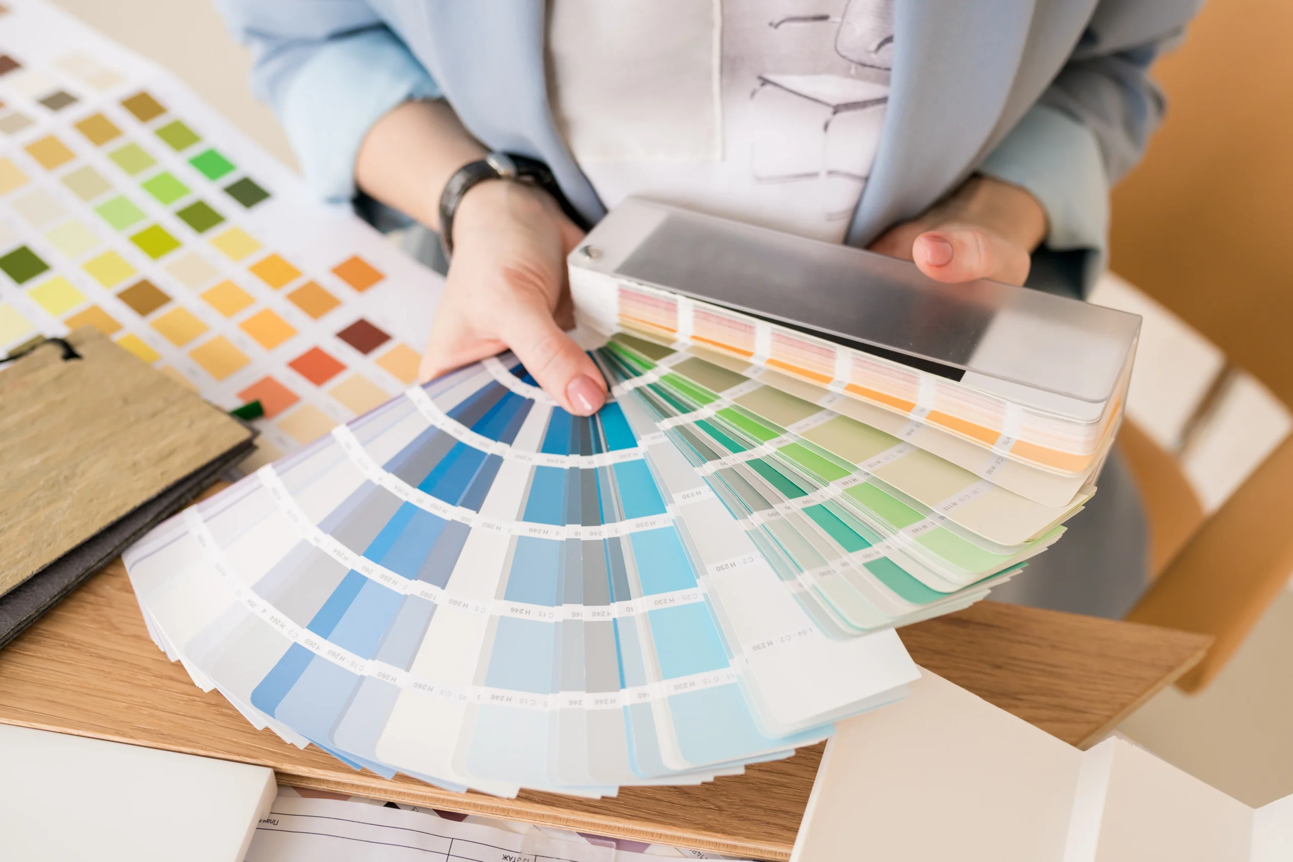 selecting interior paint colour shades using shade cards at adura paint emporium