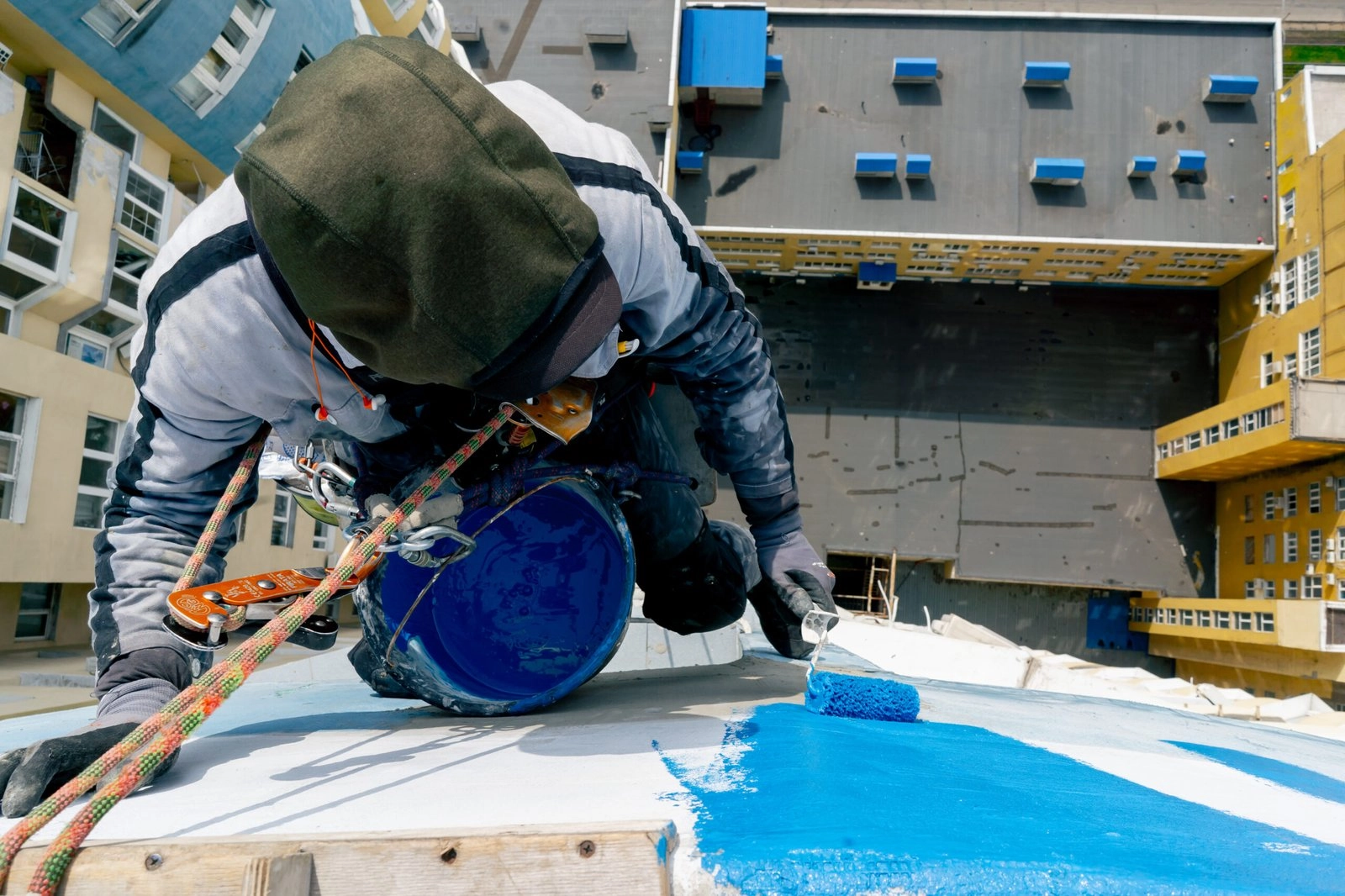 professional roof waterproofing application using protective coating at adura paint emporium